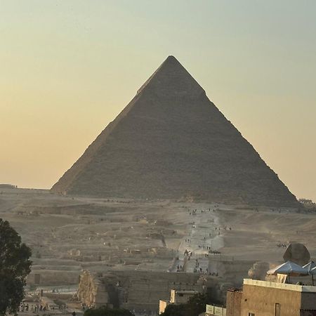 Pyramids And Sphinx Hotel Kafret el-Gabal Exteriör bild