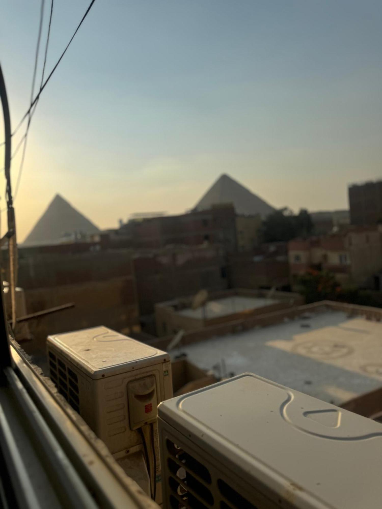 Pyramids And Sphinx Hotel Kafret el-Gabal Exteriör bild